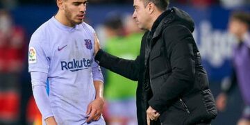 PAMPLONA, SPAIN - DECEMBER 12: Xavi Hernandez, Manager of FC Barcelona gives instructions to Abdessamad Ezzalzouli during the La Liga Santander match between CA Osasuna and FC Barcelona at Estadio El Sadar on December 12, 2021 in Pamplona, Spain. (Photo by Quality Sport Images/Getty Images)