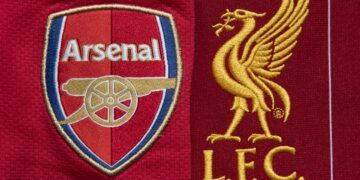 MANCHESTER, ENGLAND - MAY 04: The Liverpool and Arsenal club crests on their first team home shirts on May 4, 2020 in Manchester, England (Photo by Visionhaus)