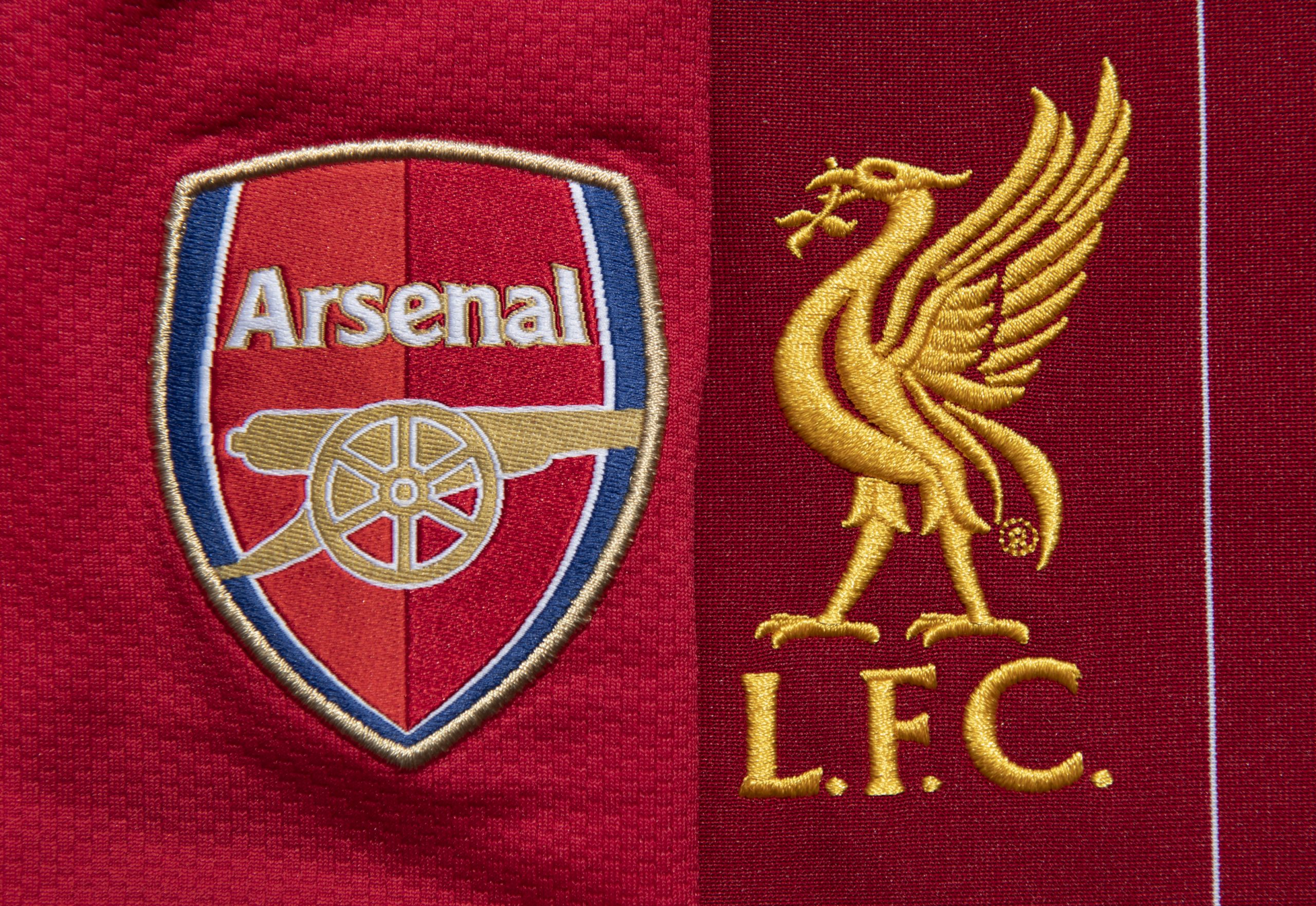 MANCHESTER, ENGLAND - MAY 04: The Liverpool and Arsenal club crests on their first team home shirts on May 4, 2020 in Manchester, England (Photo by Visionhaus)