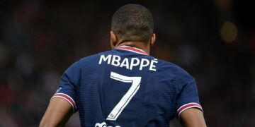 Paris Saint-Germain's French forward Kylian Mbappe runs on the pitch during the French L1 football match between Stade de Reims and Paris Saint-Germain (PSG) at Stade Auguste Delaune in Reims, northern France on August 29, 2021. (Photo by FRANCK FIFE / AFP)