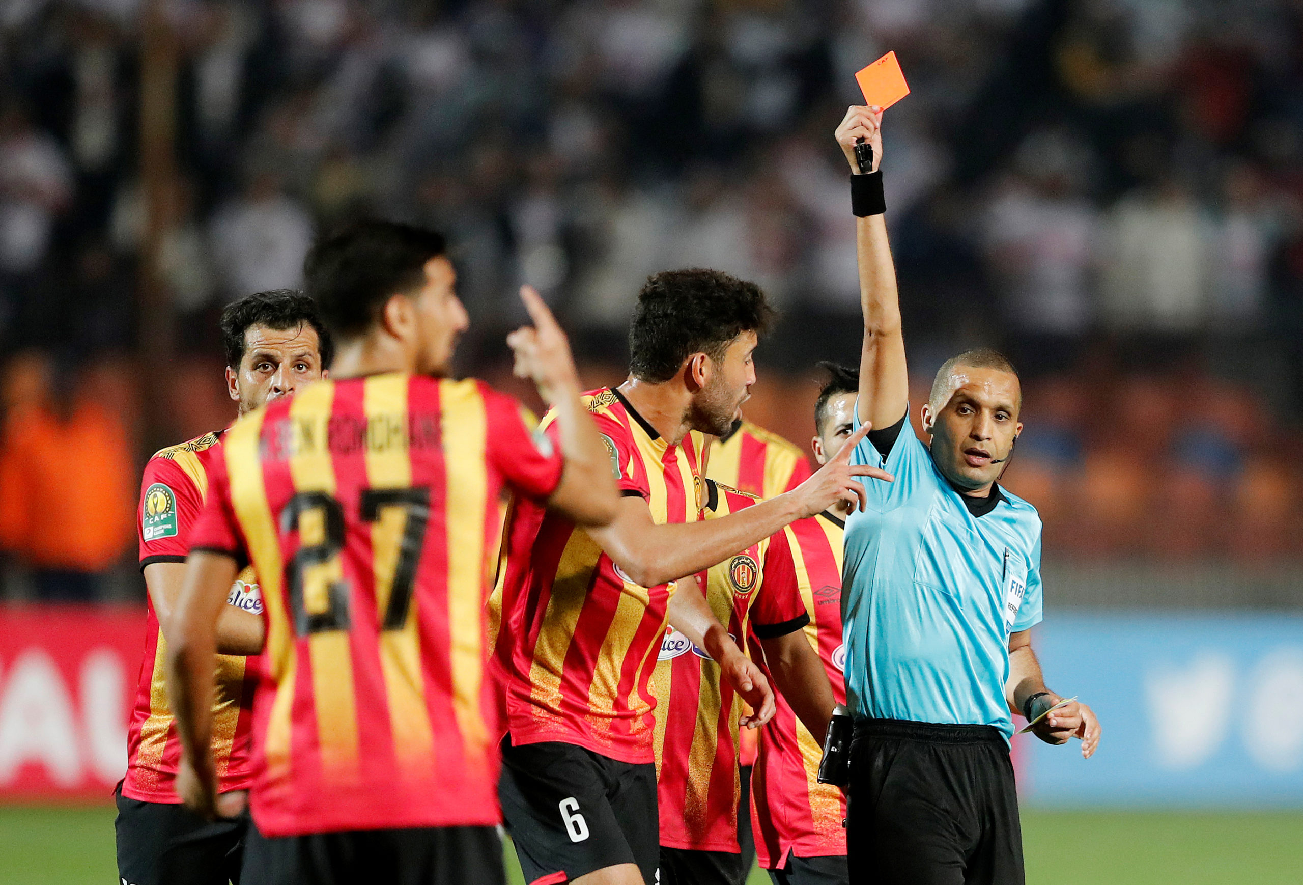 Soccer Football - African Champions League - Quarter Final First Leg - Zamalek v Esperance Sportive de Tunis - Cairo International Stadium, Cairo, Egypt - February 28, 2020   Esperance Sportive de Tunis' Mohamed Ali Ben Romdhane is sent off by Referee Redouane Jiyed    REUTERS/Amr Abdallah Dalsh