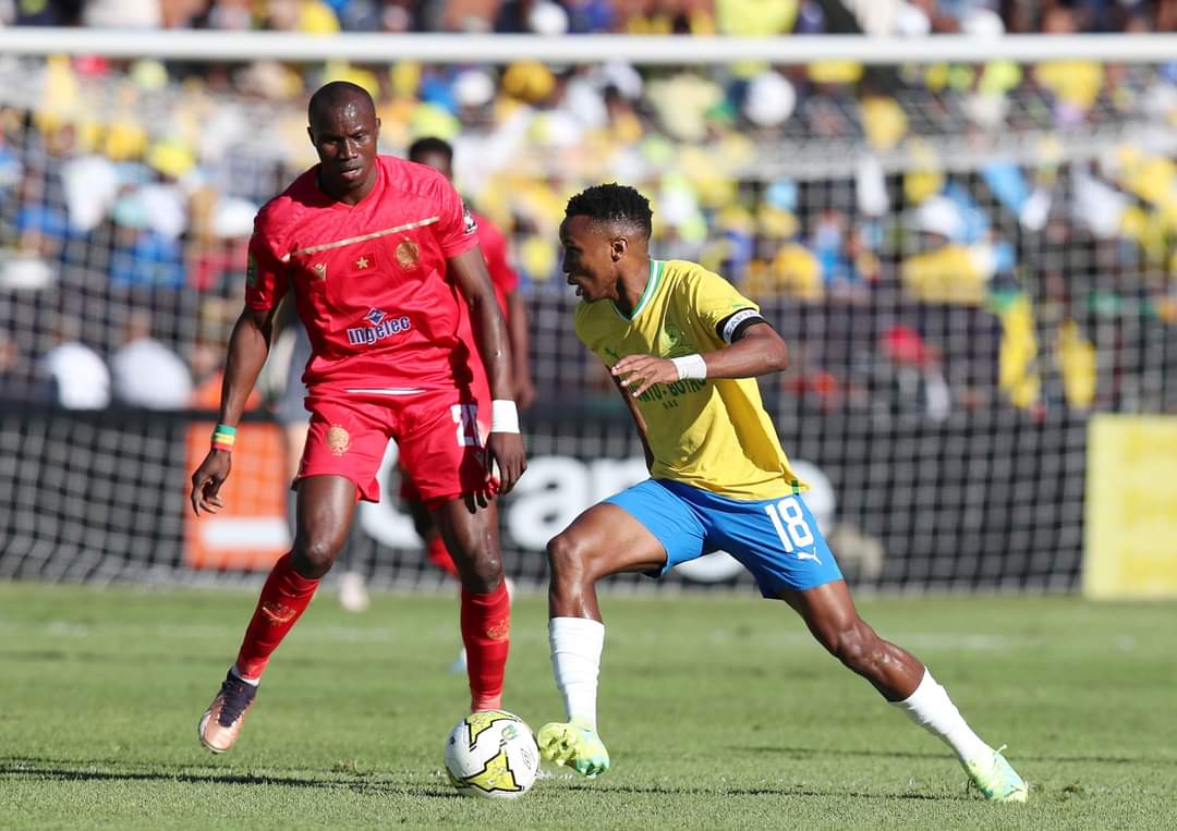 Themba Zwane of Mamelodi Sundowns challenged by Bouly Junior Sambou of Wydad during the CAF Champions League 2022/23 Semifinal match between Mamelodi Sundowns and Wydad at the Loftus Stadium, Pretoria on the 20 May 2023 ©Muzi Ntombela/BackpagePix