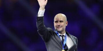 Soccer Football - Club World Cup - Final - Manchester City v Fluminense - King Abdullah Sports City, Jeddah, Saudi Arabia - December 22, 2023
Manchester City manager Pep Guardiola celebrates with his medal after winning the Club World Cup final REUTERS/Amr Abdallah Dalsh