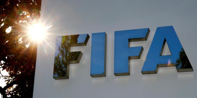 FILE PHOTO: The logo of FIFA is seen in front of its headquarters in Zurich, Switzerland September 26, 2017.   REUTERS/Arnd Wiegmann/File Photo