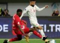 Soccer Football - Gulf Cup - Final - Bahrain v Oman - Jaber Al Ahmad International Stadium, Kuwait City, Kuwait - January 4, 2025 Bahrain's Mohamed Marhoon in action with Oman's Thani Al Rushaidi REUTERS/Mohamed Abd El Ghany