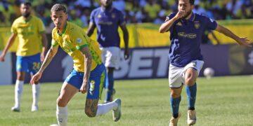Arthur Sales of Mamelodi Sundowns challenged by Houssem Tka of Esperance Tunis during the CAF Champions League 2025/26 semi final 2nd Leg match between Mamelodi Sundowns and Esperance at Loftus Versfeld Stadium in Pretoria on 17 April 2026 ©Samuel ShivambuBackpagePix