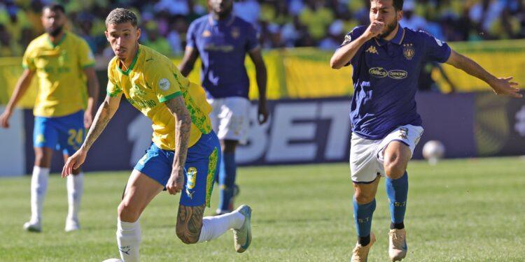 Arthur Sales of Mamelodi Sundowns challenged by Houssem Tka of Esperance Tunis during the CAF Champions League 2025/26 semi final 2nd Leg match between Mamelodi Sundowns and Esperance at Loftus Versfeld Stadium in Pretoria on 17 April 2026 ©Samuel ShivambuBackpagePix