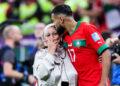 Sofiane Boufal (R) of Morocco celebrates with a family member after winning the Quarterfinal between Morocco and Portugal of the 2022 FIFA World Cup at Al Thumama Stadium in Doha, Qatar, December 10, 2022. (Photo by Cao Can/Xinhua/ABACAPRESS.COM - Photo by Icon sport