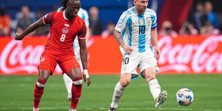 Jun 20, 2024; Atlanta, GA, USA; Argentina forward Lionel Messi (10) plays the ball in front of Canada midfielder Ismael Kone (8) during the first half at Mercedez-Benz Stadium. Mandatory Credit: Dale Zanine-USA TODAY Sports/Sipa USA