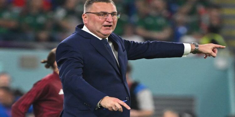 Poland's coach Czeslaw Michniewicz shouts instructions to his players from the touchline during the Qatar 2022 World Cup Group C football match between Mexico and Poland at Stadium 974 in Doha on November 22, 2022. (Photo by ANDREJ ISAKOVIC / AFP) (Photo by ANDREJ ISAKOVIC/AFP via Getty Images)