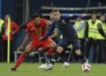 France's Antoine Griezmann, shields the ball from Belgium's Moussa Dembele during the semifinal match between France and Belgium at the 2018 soccer World Cup in the St. Petersburg Stadium in, St. Petersburg, Russia, Tuesday, July 10, 2018. (AP Photo/Natacha Pisarenko)